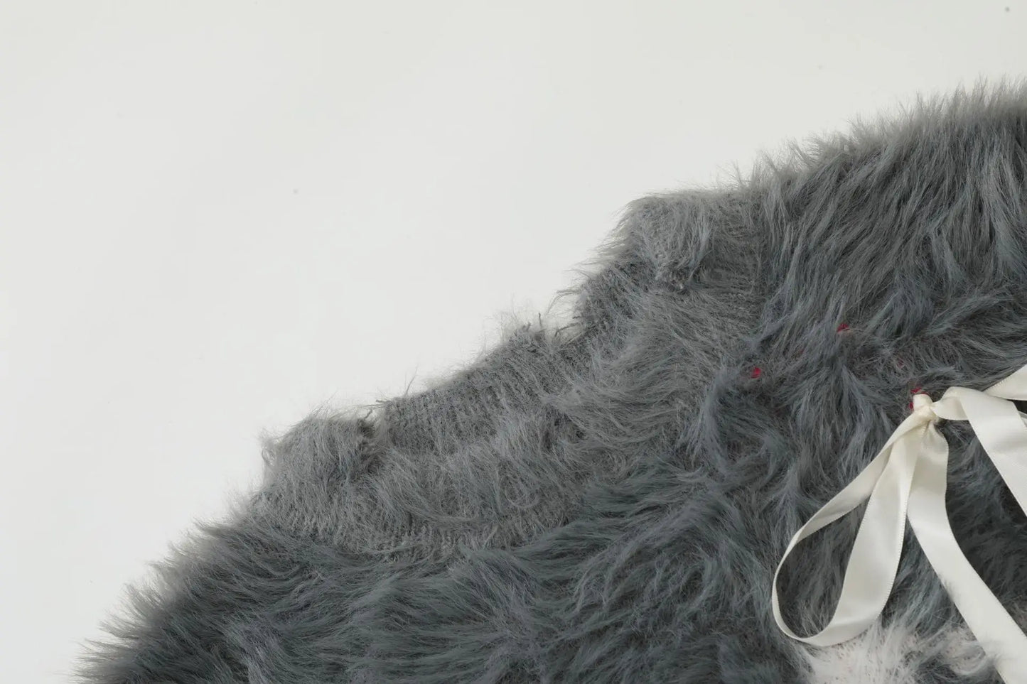 American sweet and cool bow sweater women's autumn and winter new loose soft waxy retro loose sweater outside the coat.